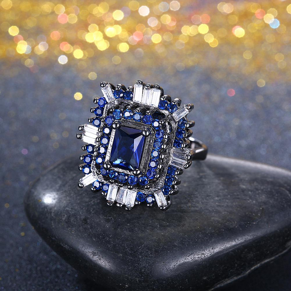 Blue & White Swarovski Halo Ring in Black Gun Plating