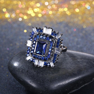 Blue & White Swarovski Halo Ring in Black Gun Plating