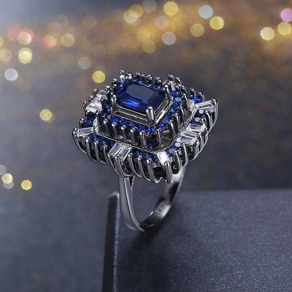Blue & White Swarovski Halo Ring in Black Gun Plating